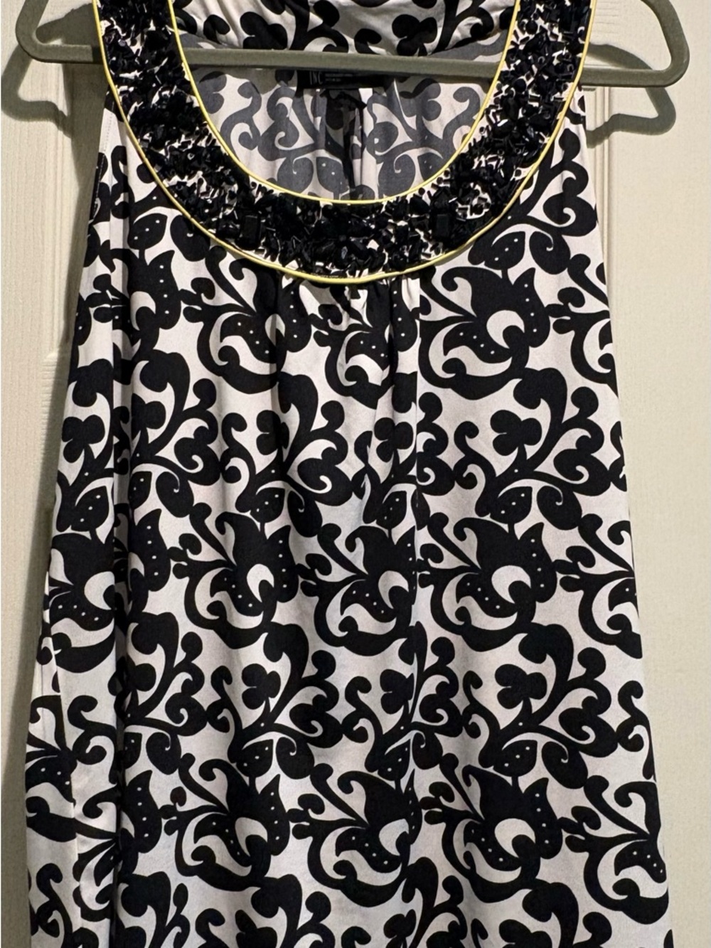 Black & White Floral Print Sleeveless Top with Embellished Neckline